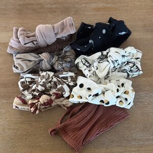 Kate Quinn assorted bows and hat